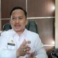 PROFIL: Kepala Bappeda Sumenep Arif Firmanto berada di ruang kerjanya (dok. Istimewa Redaksi Rekam Satu)