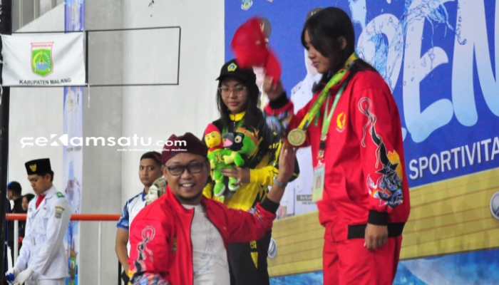PROFIL: Ajeng Ayu Syarifah, atlet Sumenep Cabor Akuatik berhasil mempertahankan medali emas pertama untuk Kabupaten Sumenep di Porprov Jatim IX 2025 (dok. Istimewa/Redaksi Rekam Satu)