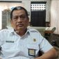 PROFIL: Kepala Dinas PUTR Sumenep Ery Susanto berada di ruang kerjanya (dok. Istimewa/Redaksi Rekam Satu)