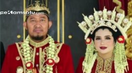 PROFIL: Bupati Sumenep Achmad Fauzi Wongsojudo bersama sang istri Nia Kurnia Fauzi mengenakan baju adat  (dok: istimewa/Redaksi Rekam Satu)