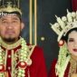PROFIL: Bupati Sumenep Achmad Fauzi Wongsojudo bersama sang istri Nia Kurnia Fauzi mengenakan baju adat  (dok: istimewa/Redaksi Rekam Satu)