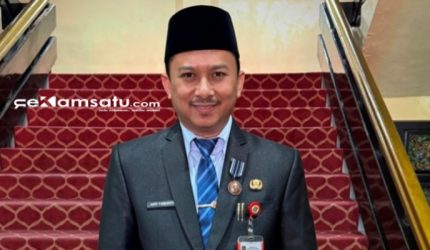 PROFIL: Kepala Bappeda Sumenep Arif Firmanto berada di kantor Pemkab Sumenep (dok: istimewa/Redaksi Rekam Satu)